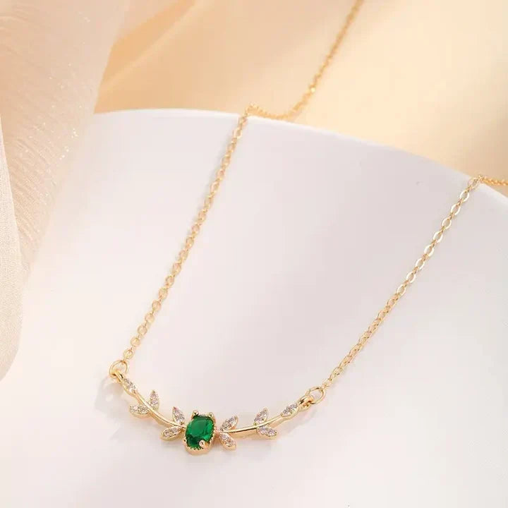 Delicate Necklace with Emerald Green Stone and Rhinestone Leaves