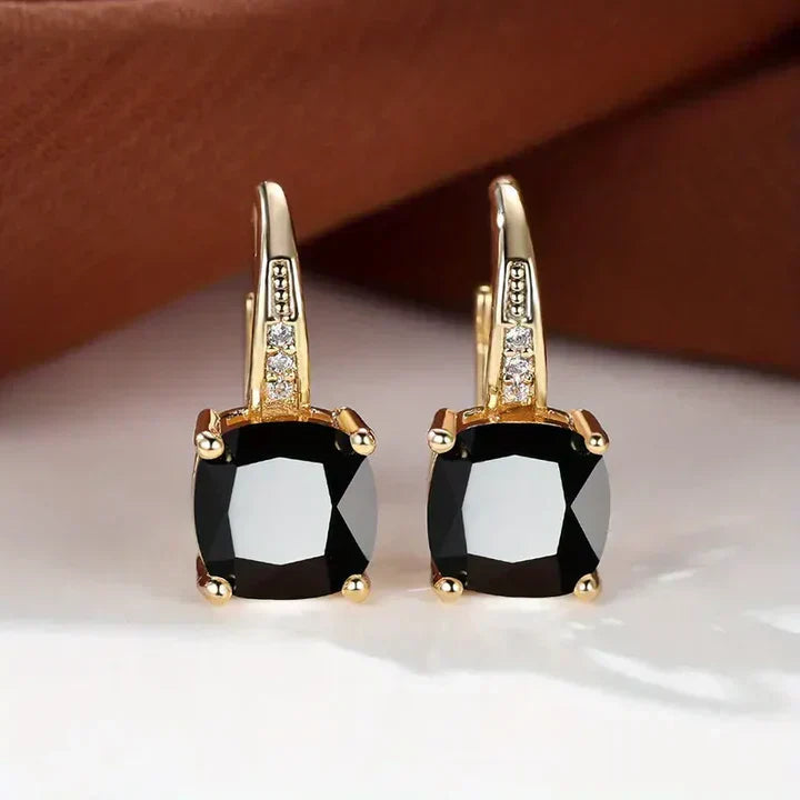 Sparkling hoop earrings with cushion-cut cubic zirconia