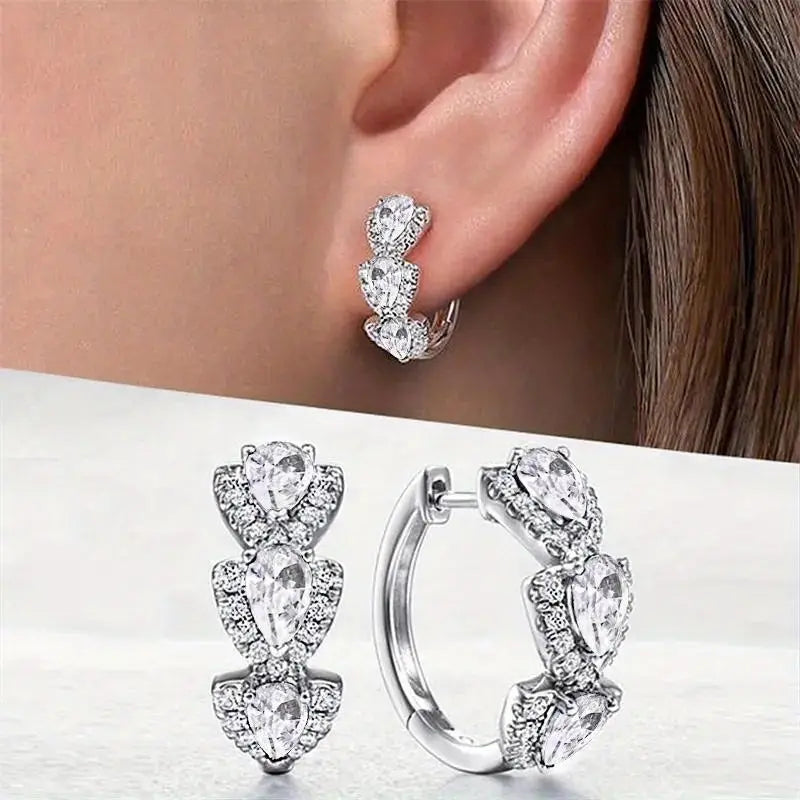 Elegant teardrop-shaped earrings with sparkling cubic zirconia and coloured crystals
