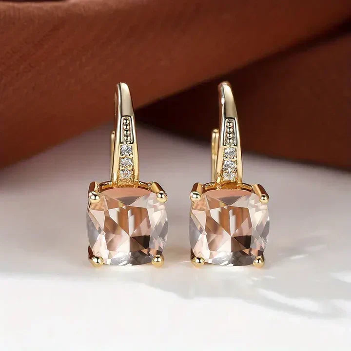 Sparkling hoop earrings with cushion-cut cubic zirconia