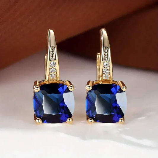 Sparkling hoop earrings with cushion-cut cubic zirconia