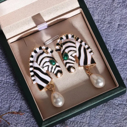 Elegant zebra-print earrings with green cubic zirconia and freshwater pearls