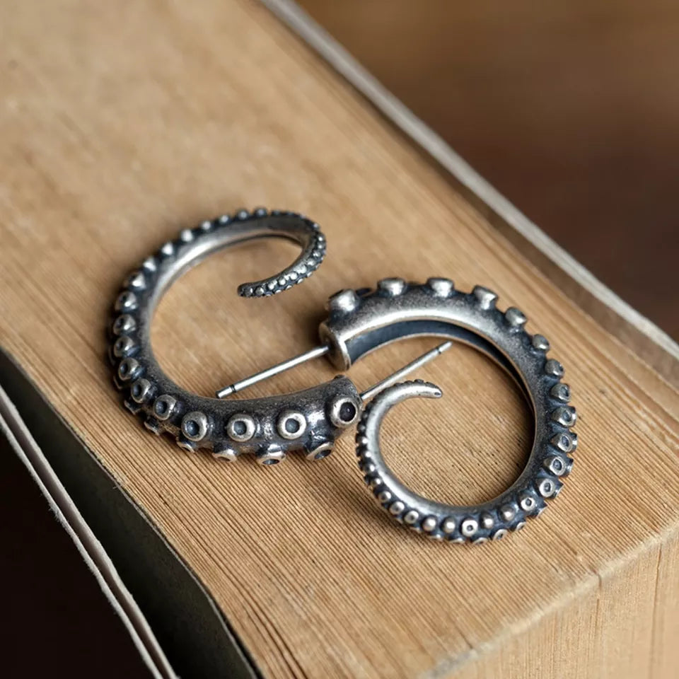 Expressive earrings featuring octopus tentacles in a vintage style