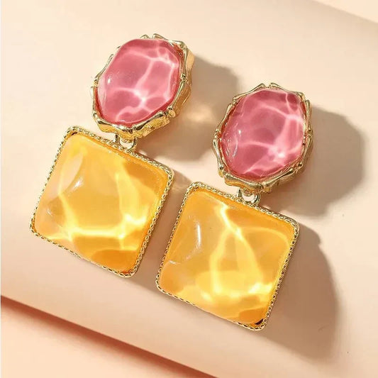 Elegant earrings with pink glass and yellow resin