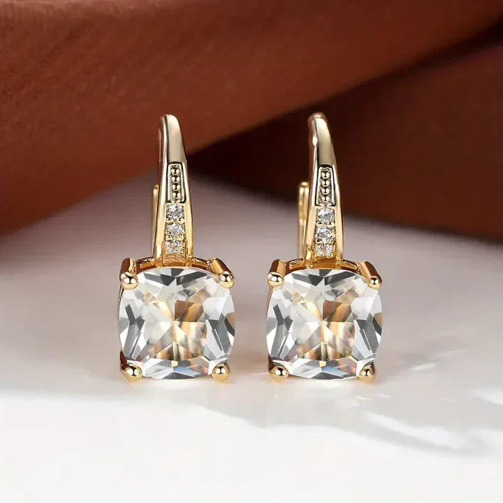 Sparkling hoop earrings with cushion-cut cubic zirconia