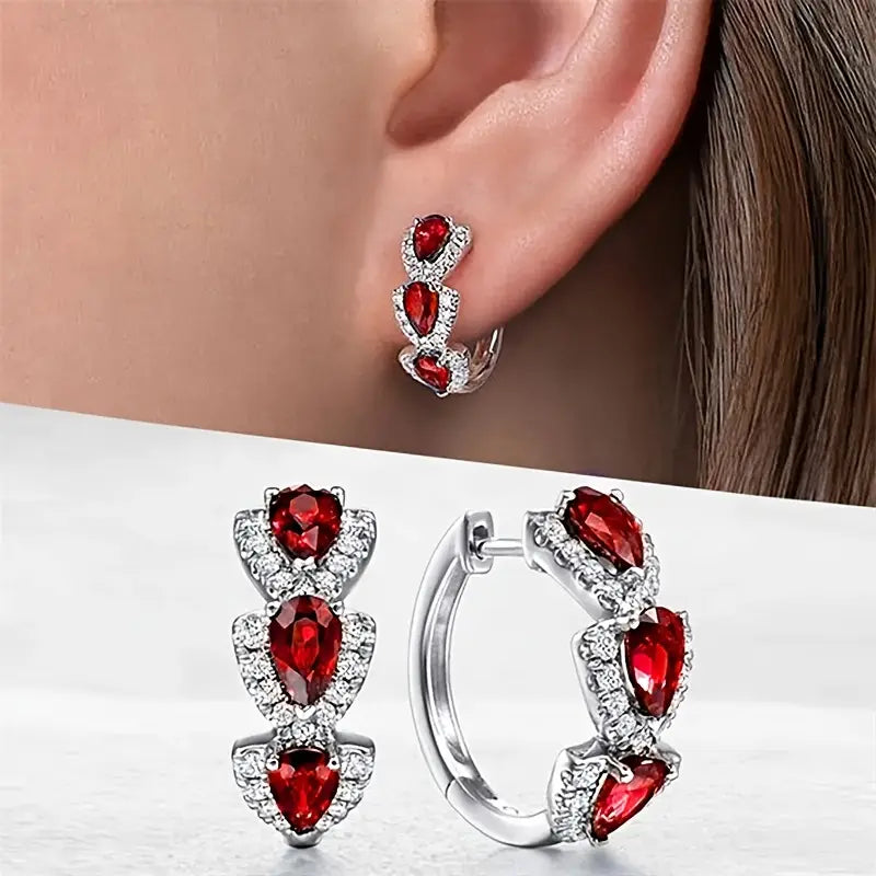 Elegant teardrop-shaped earrings with sparkling cubic zirconia and coloured crystals