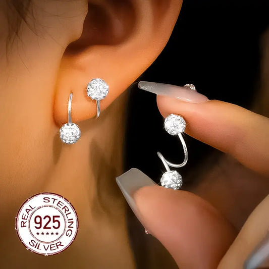 Double-helix zirconia earrings with sparkling beads