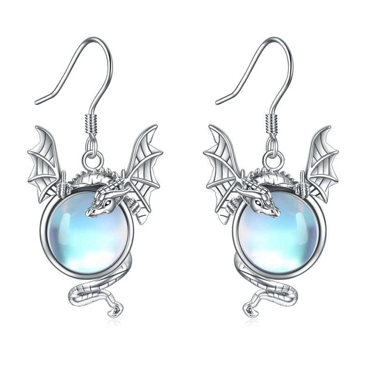 Mystical dragon earrings with a sparkling moonstone and filigree wings