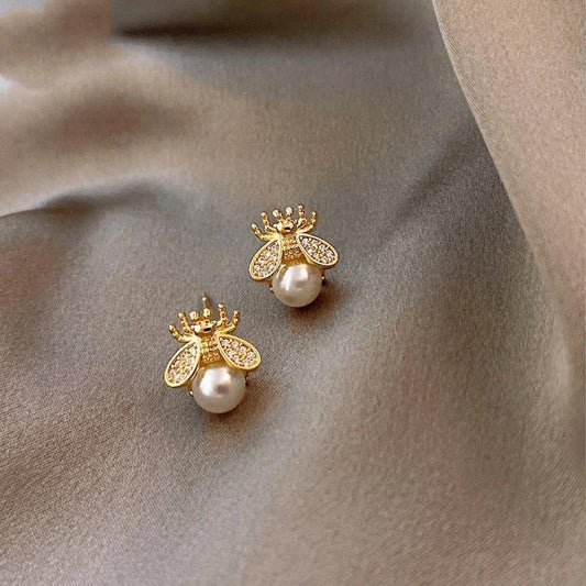 Elegant bee earrings with zirconia wings and pearls