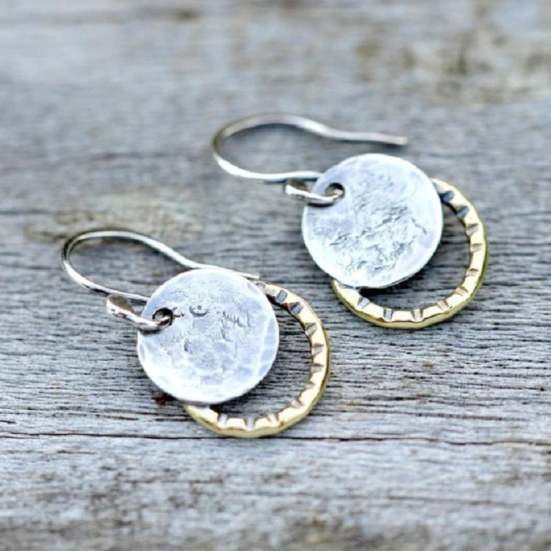 Hammered earrings with discs and ring-shaped details