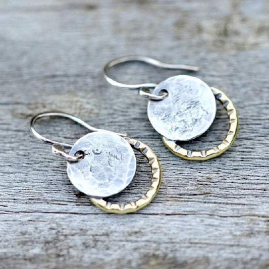 Hammered earrings with discs and ring-shaped details
