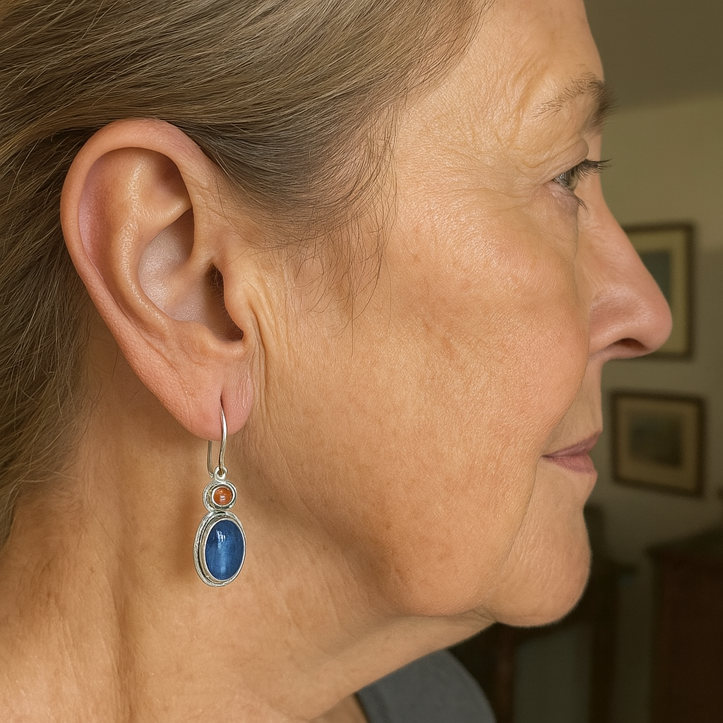 Oval blue kyanite earrings with shiny amber details