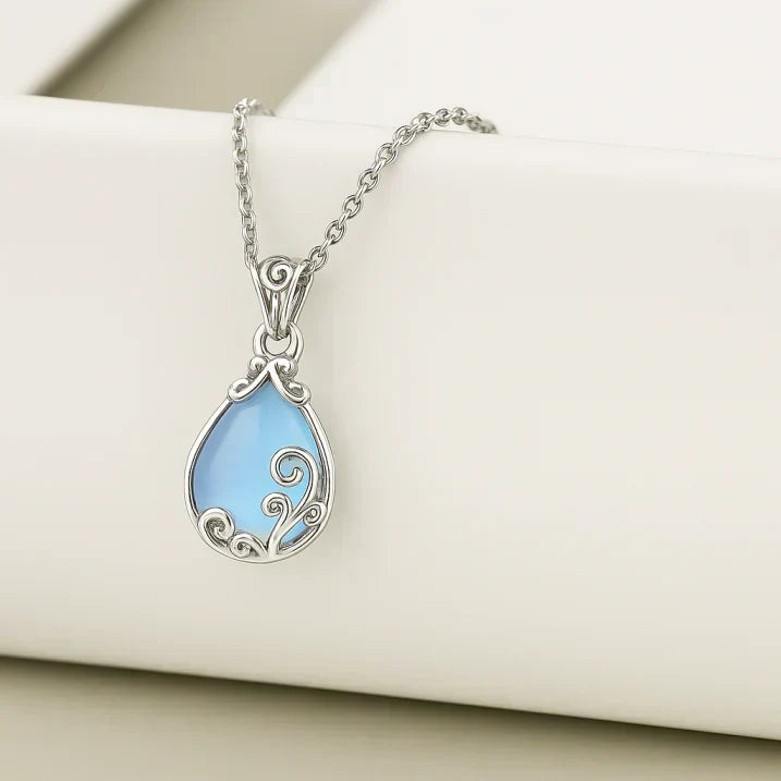 Teardrop Moonstone Pendant Decorated with Delicate Ornaments