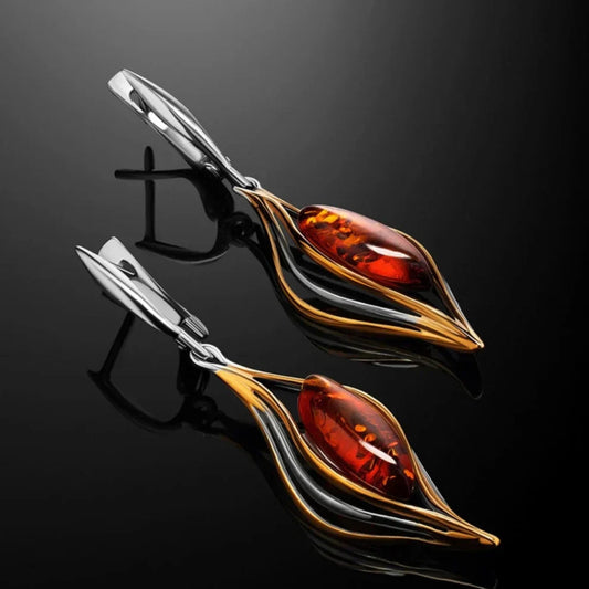 Elegant earrings featuring sparkling amber and a wavy design