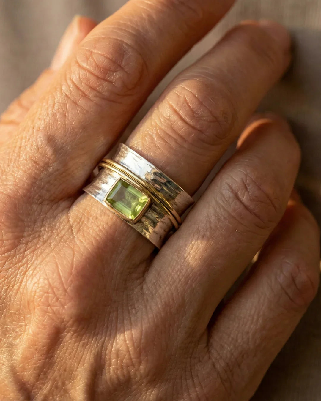 Handcrafted Silver Ring with Peridot Gemstone and Gold Details