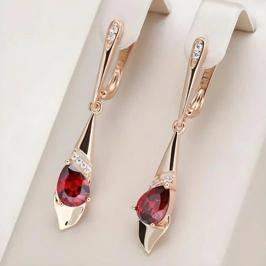 Elegant earrings with red teardrop-shaped crystals and zirconia detailing