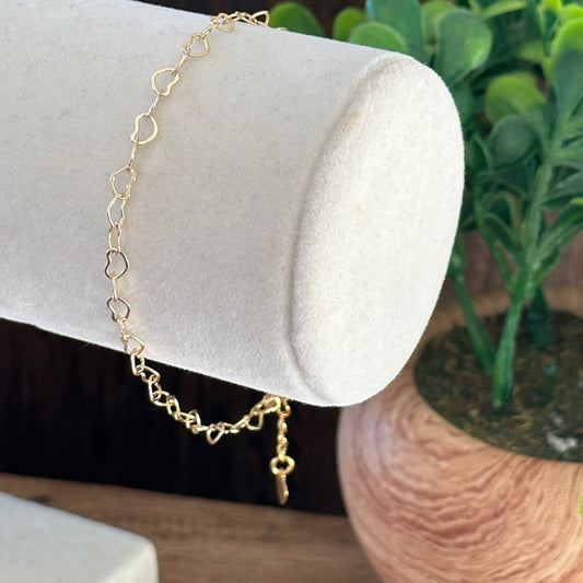 Filigree heart-link bracelet with a delicate key pendant