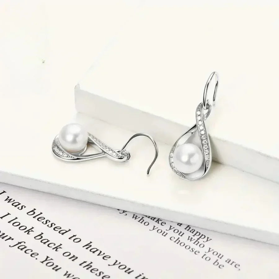 Elegant earrings with freshwater pearls and sparkling cubic zirconia