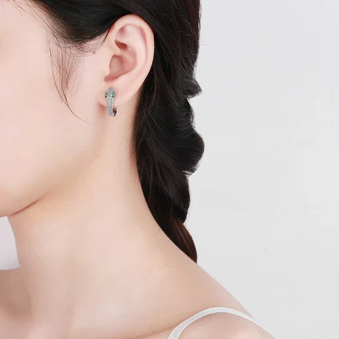 Brilliant Snake Earrings with Cubic Zirconia and Green Emerald Eyes