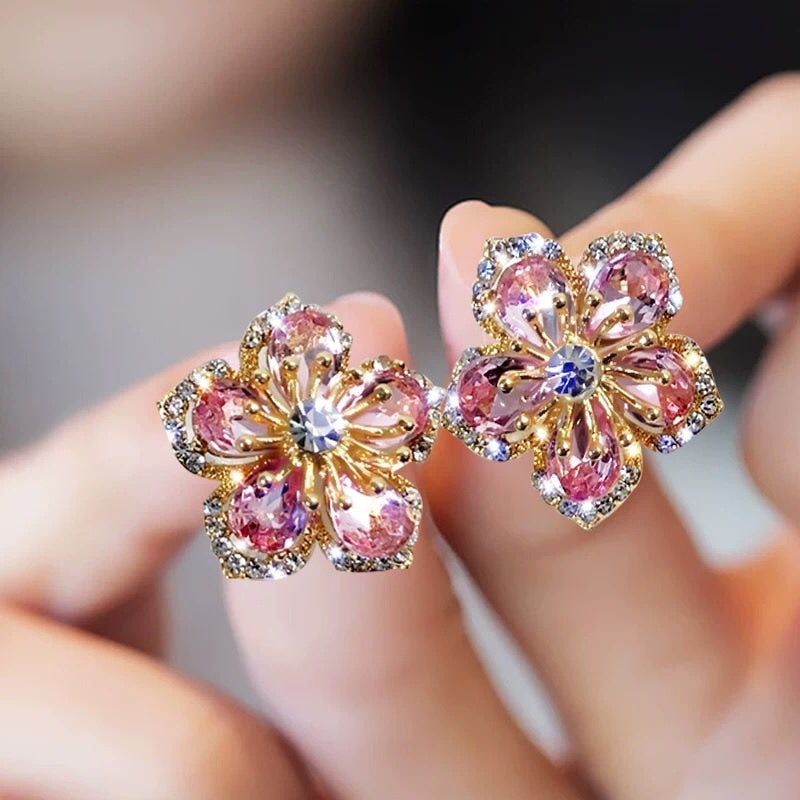 Sparkling flower earrings with pink and blue cubic zirconia stones