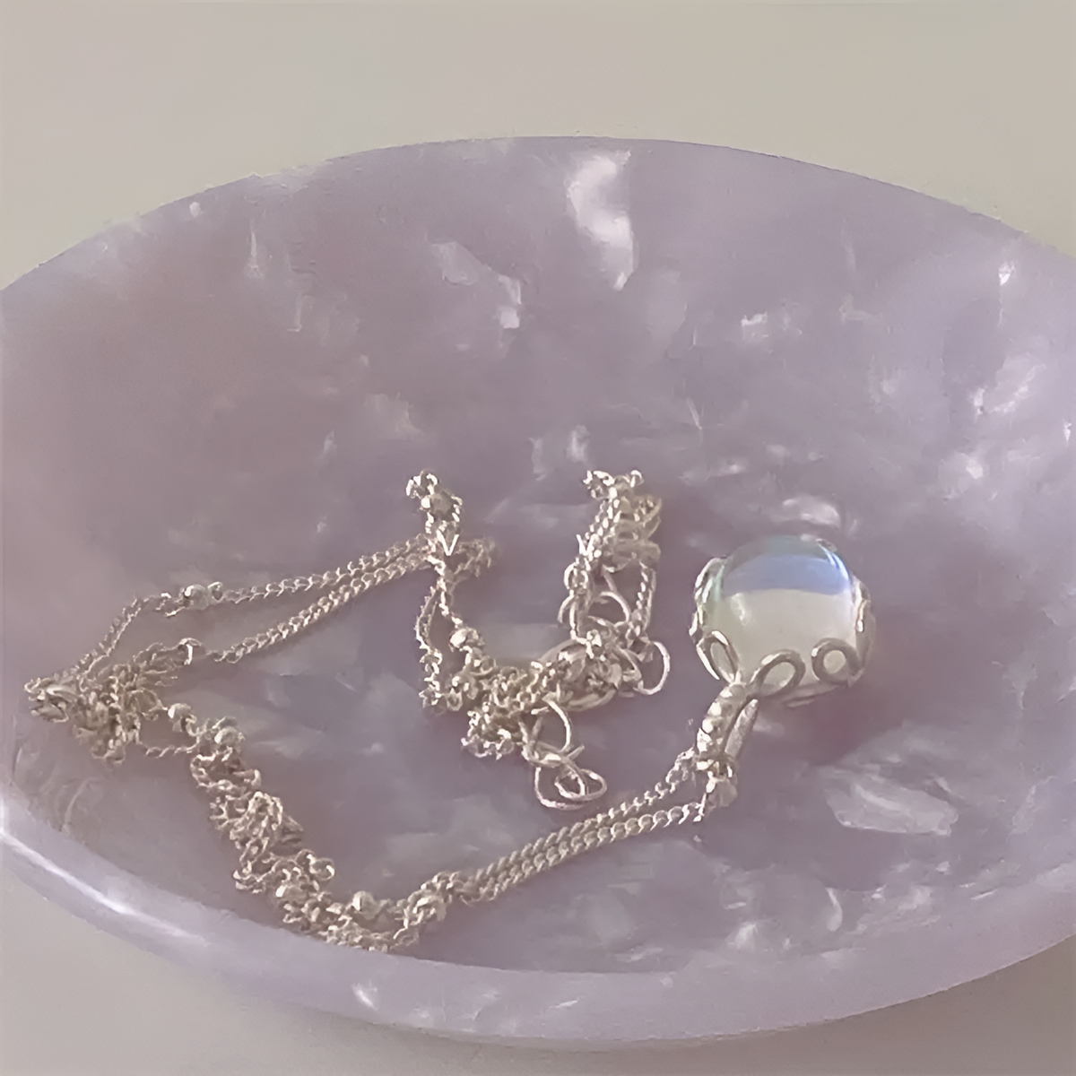 Elegant Moonstone Necklace with Filigree Setting and Delicate Chain