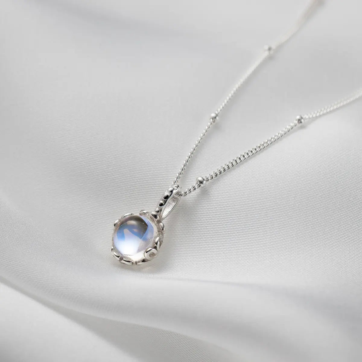 Elegant Moonstone Necklace with Filigree Setting and Delicate Chain