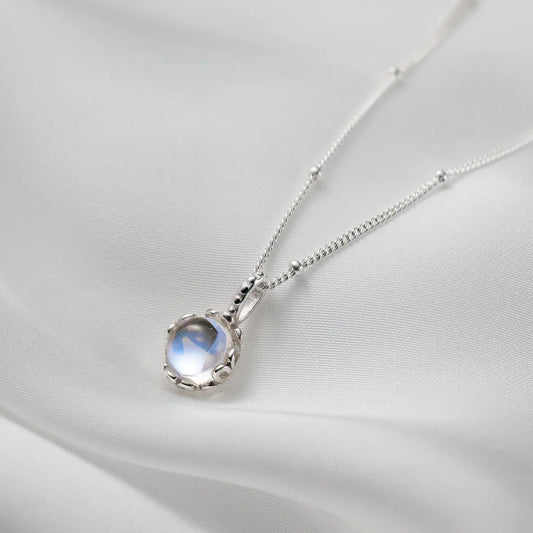 Elegant Moonstone Necklace with Filigree Setting and Delicate Chain