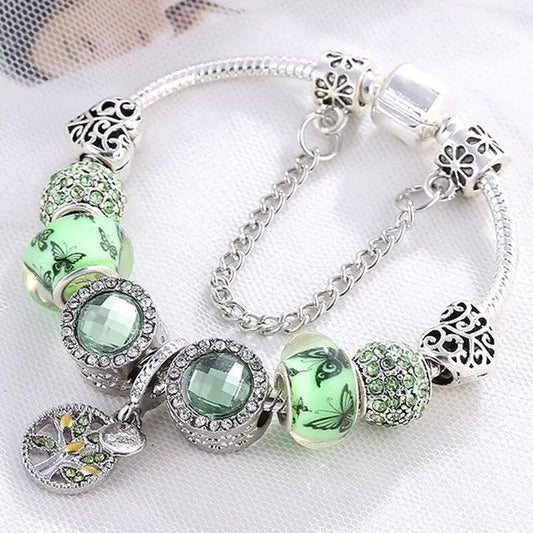 Bracelet featuring two diamonds with green crystals and lovely butterflies