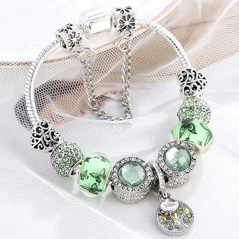 Bracelet featuring two diamonds with green crystals and lovely butterflies