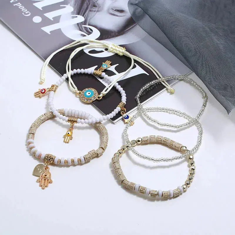 Boho bracelet set featuring a Nazar eye, a Hamsa and beads