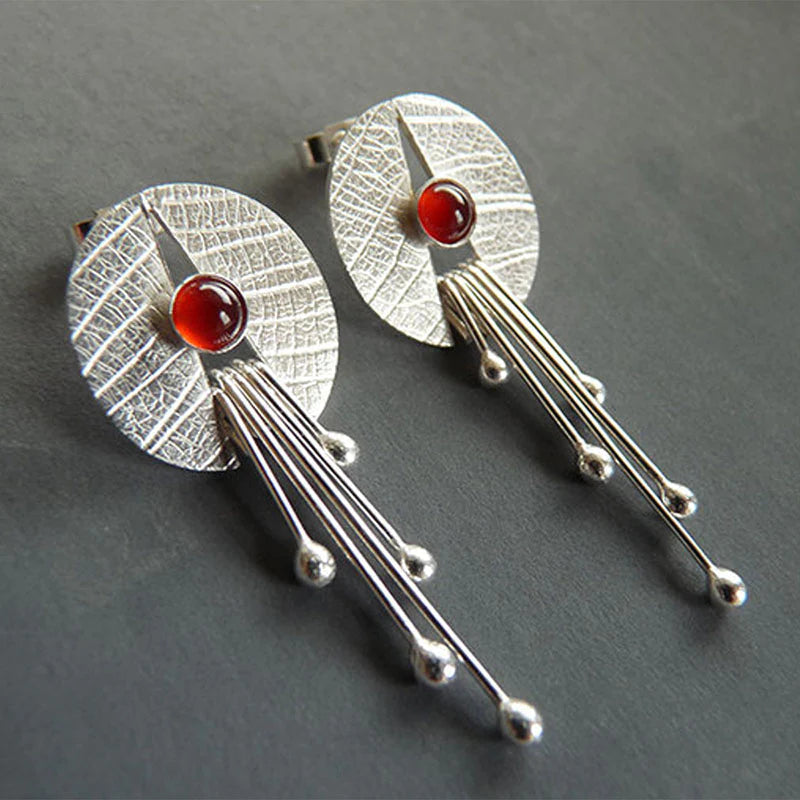 Artistic Earrings with Deep Red Stone and Modern Dangle Elements