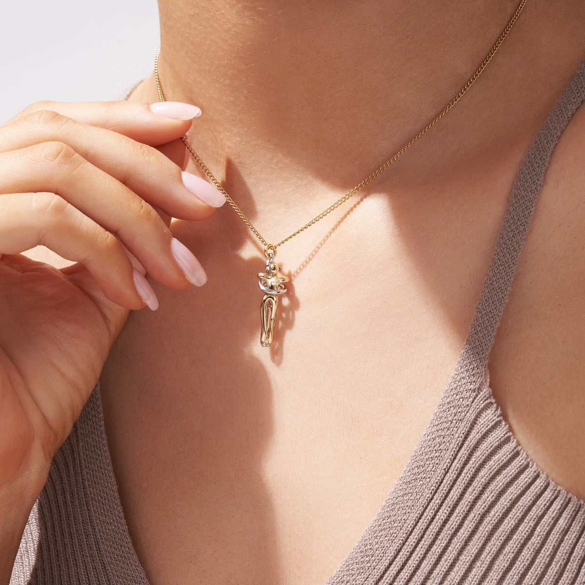 Hug Pendant Necklace: Symbol of Love and Connection