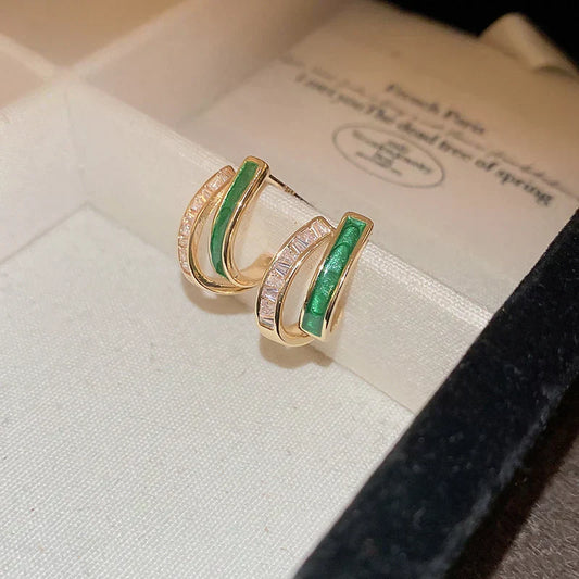 Elegant hoop earrings with bright green enamel and sparkling cubic zirconia stones