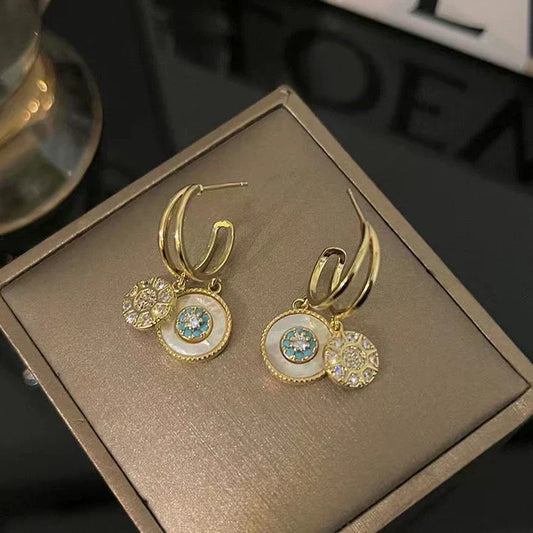 Shell earrings with turquoise detailing and sparkling cubic zirconia stones