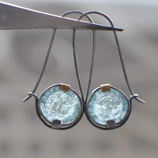 Antique crystal earrings with a unique moon-shaped design