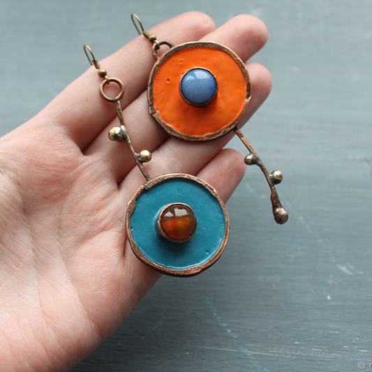 Unique enamelled earrings with round pendants and coloured stones