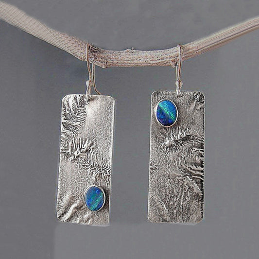 Vintage textured earrings with brilliant blue opals