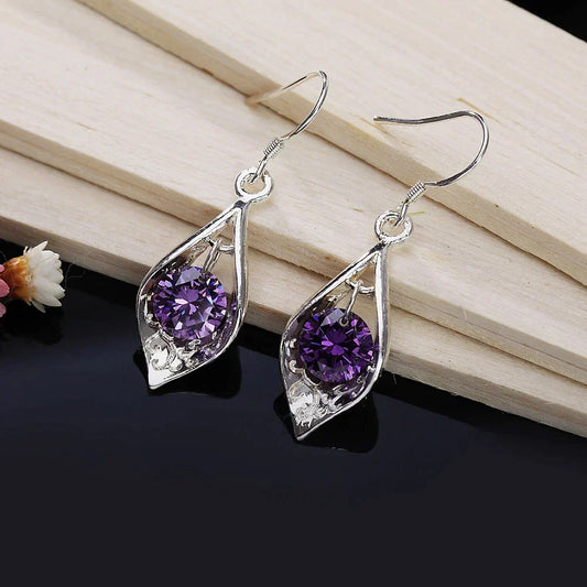 Shimmering violet crystal earrings with an elegant teardrop design