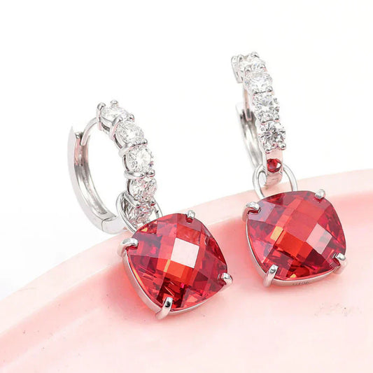 Cushion-cut earrings featuring brilliant-cut rubies and diamond-look cubic zirconia stones