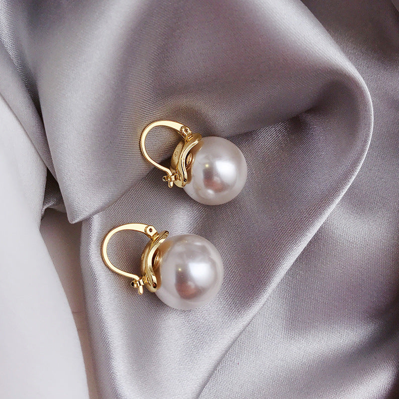 Elegant pearl earrings with delicate clasps