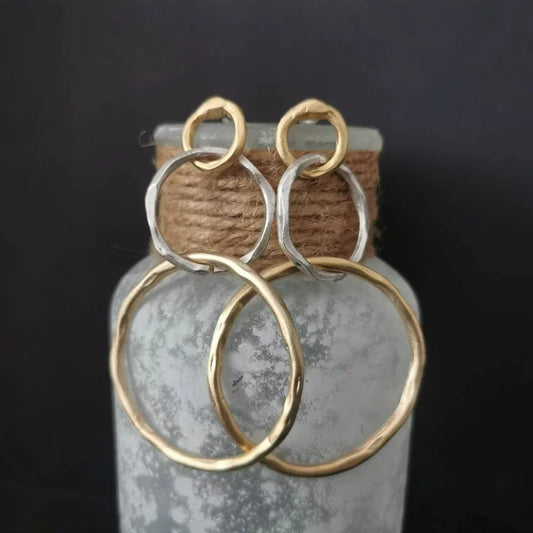 Elegant two-tone earrings with a round, hammered finish