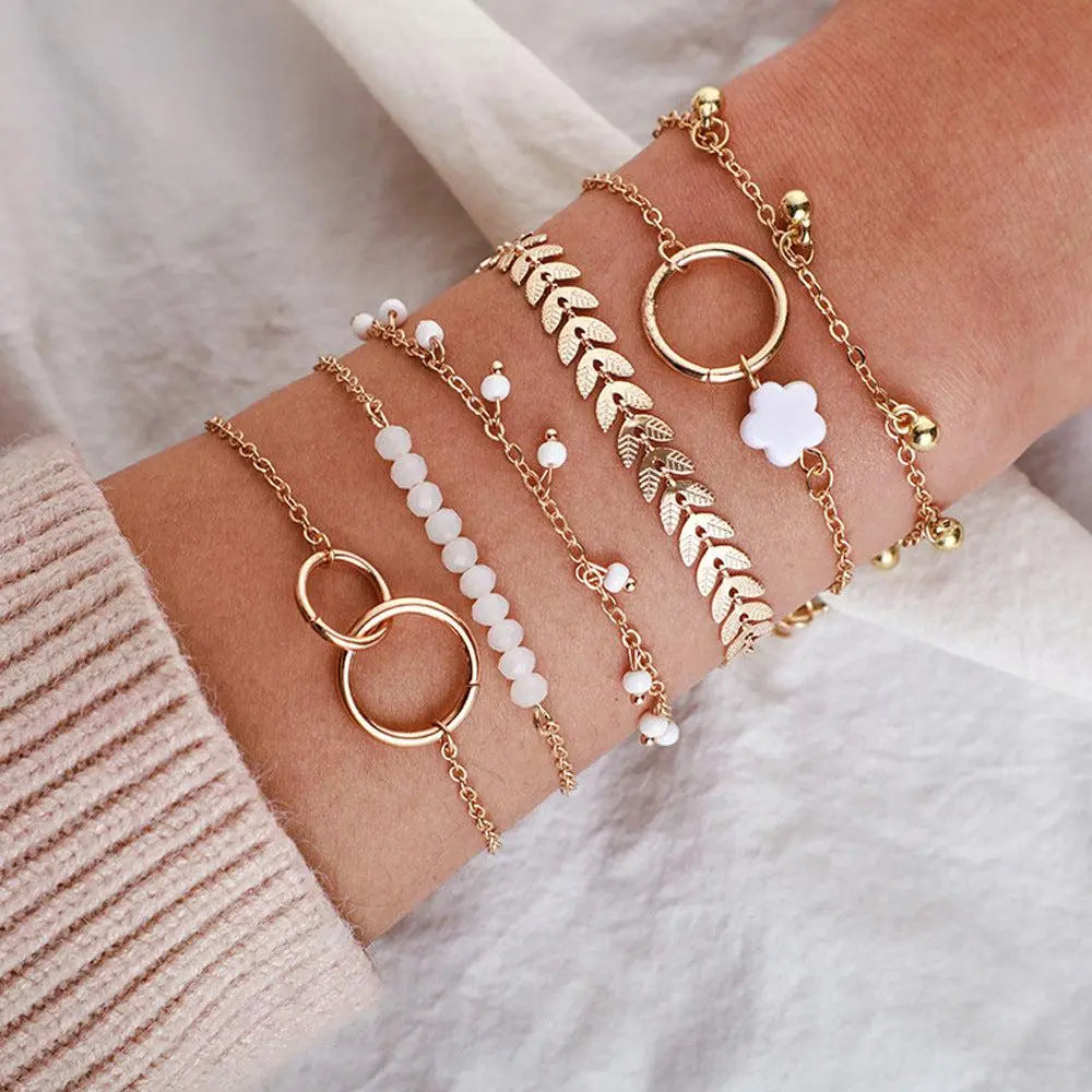 A fun bracelet with leaves and white beads