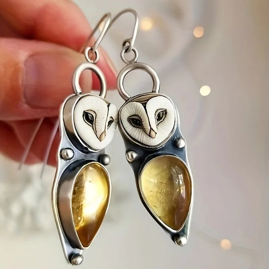 Handmade owl earrings with cabochon stones and an antique finish