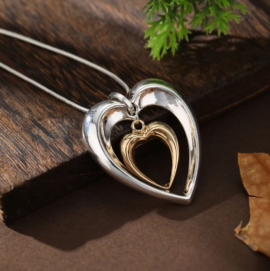 Two-Tone Heart Necklace with Delicate Interlocking Heart Pendant