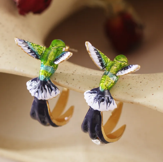 Elegant hummingbird earrings with bright green enamel details