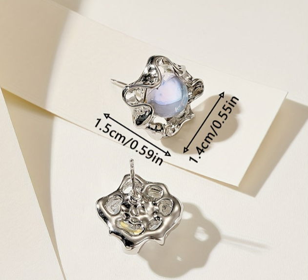 Moonstone earrings with an organic, wavy design