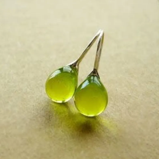 Elegant earrings featuring teardrop-shaped cabochons in vibrant colours