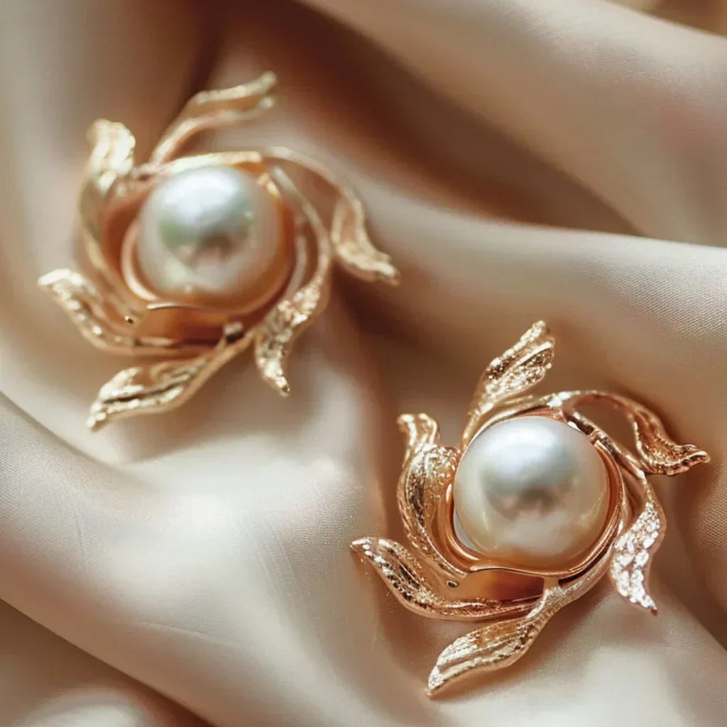 Elegant pearl earrings with an artistic flower-shaped design