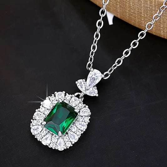 Elegant Emerald Pendant with Cubic Zirconia Halo on a Delicate Chain
