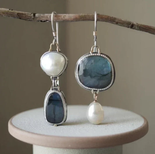 Elegant earrings featuring labradorite and irregularly shaped baroque pearls